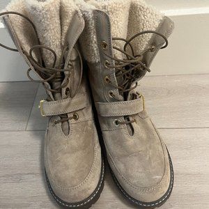 Brand new Stuart Weitzman shearling boots